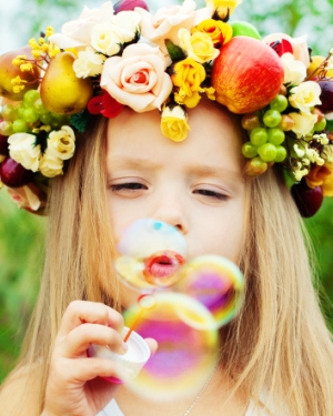 Girl blowing bubbles