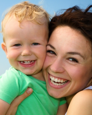 Mother and son smiling
